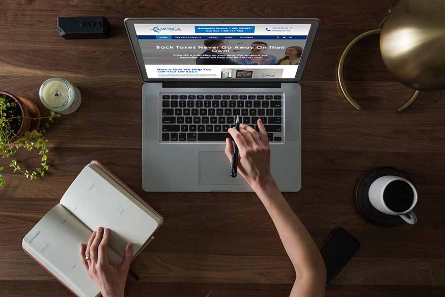 America Tax Relief website in laptop screen